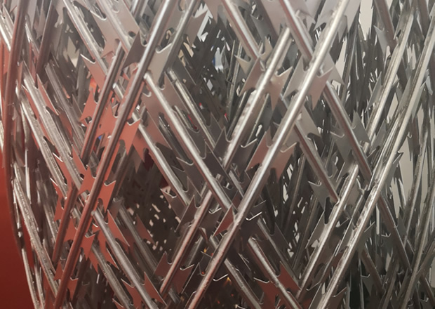 Concertina wire welded sheet for military uses
